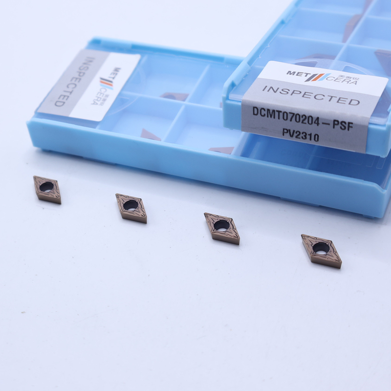 Chèn quay Cermet có thể chỉ mục, Chèn quay bên trong được phủ PVD, Bộ phá vỡ chip hoàn thiện DCMT070204, Màu đồng